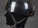 an image of a helmet on a mannequin head on a gray background