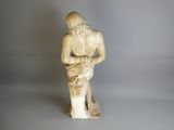 statue of a woman holding a baby in her arms