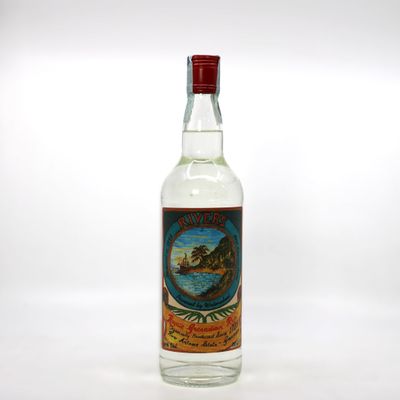 an image of a bottle of alcohol sitting on top of a table