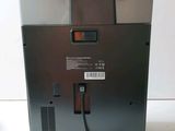 an image of a close up of a machine with a cord