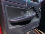 a picture of a car door handle and the door handle of a car