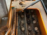 an image of a machine that is working on a piece of machinery