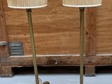 two lamps that are sitting on a table