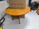 a box sitting on top of a table in an office