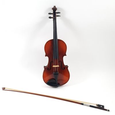 a violin and a bow on a white background