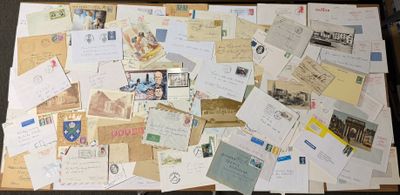 a suitcase full of letters and postcards sitting on a table