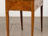 an old wooden table with a drawer on top of it on a hard wood floor