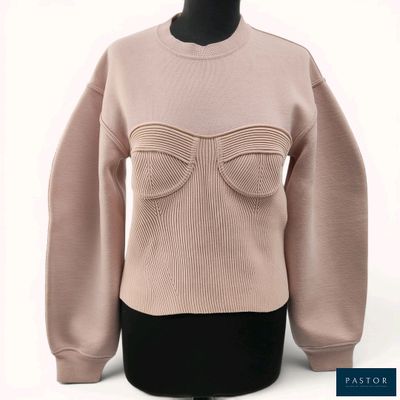 an image of a woman ' s sweater on a mannequin mannequin