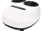 a white and black machine that is sitting on a white surface