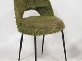 two green chairs with black legs and a green chair with a fuzzy seat