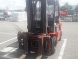 a forklift that is parked in a parking lot
