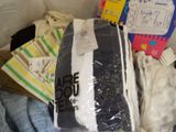 a box full of clothes and other items that are in it