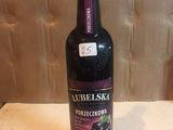 a bottle of wine that is sitting on a table