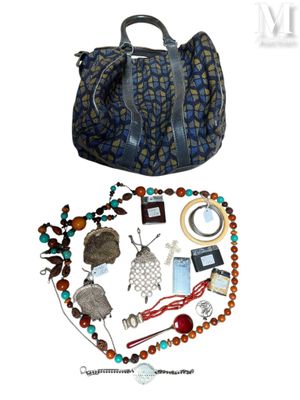 a picture of a purse and some jewelry on a white background