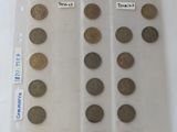 a lot of coins in a plastic bag on a table