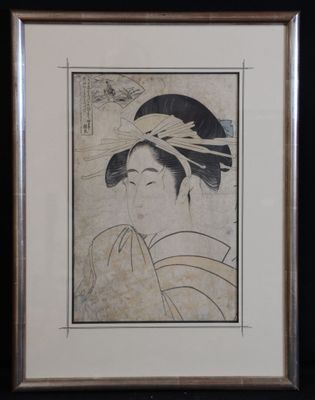 an old picture of a woman with a hat on her head