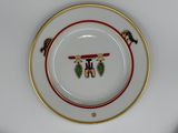a plate with a picture of a man and a woman on it