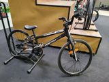 a bike that is sitting on a stand in a room