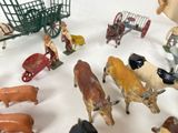 a lot of toy animals that are on a table