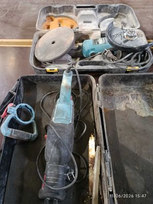 a box with tools in it sitting on the floor