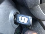 a close up of a car key in the front seat of a car