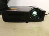 a small projector that is sitting on a table