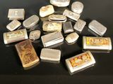 many different types of lighters sitting on a table