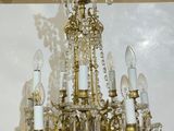a chandelier hanging from the ceiling in a room