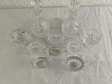a lot of glass items that are on a table