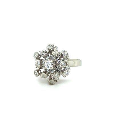 an image of a diamond cluster ring on a white background