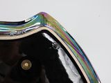 someone is taking a picture of a colorful glass vase on a white surface