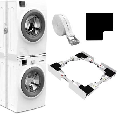 une machine à laver blanche posée à côté d'un lave-linge blanc