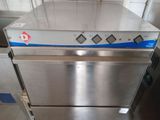 an image of a stainless steel oven sitting in a kitchen