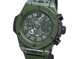 a picture of a watch that is green and black