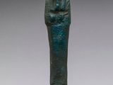 an egyptian bronze statue of a pharaoh