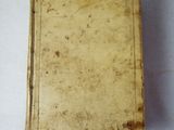 an old book that is sitting on a table