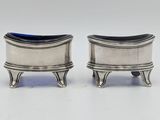 pair of silverplated salt and pepper shakers on stands