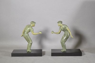 pair of art deco bronze figurines of a man and a woman