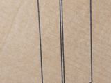 a cardboard box with a drawing of a milk carton on it