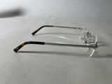 pair of glasses on a table with a white background