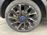 a close up view of a tire on a car