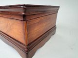 a wooden box that is sitting on a table