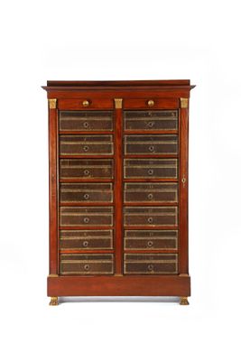 a large wooden cabinet with many drawers and drawers on top