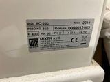 a label on the back of a machine that is sitting on a table