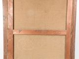 an old picture frame with a piece of cardboard on it