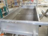 a picture of a metal sink in a building