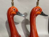 two lamps that are sitting on a table