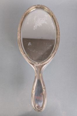 a mirror that is sitting on top of a table