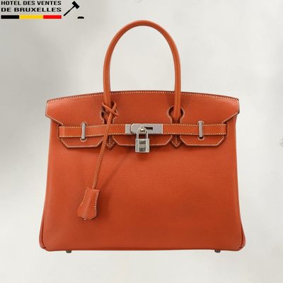 hermes hermes handbag in orange leather with silver hardware