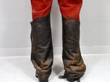 a close up of a pair of boots that are worn